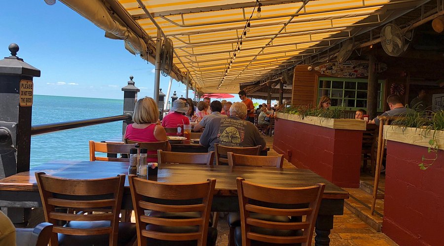 Island Fish Co. in Marathon with tiki bar seating and sunset waterfront views